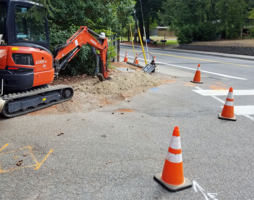 Crew performing an underground utility installation